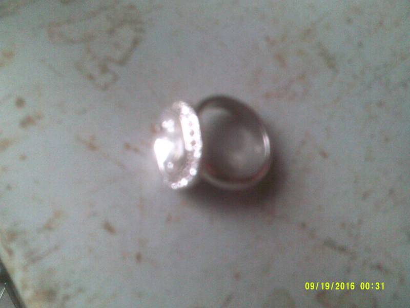 lot 14 image: SILVER AND DIAMOND RING