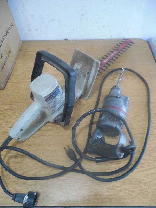 lot 19 image: HEDGE TRIMMER & 12 DRILL