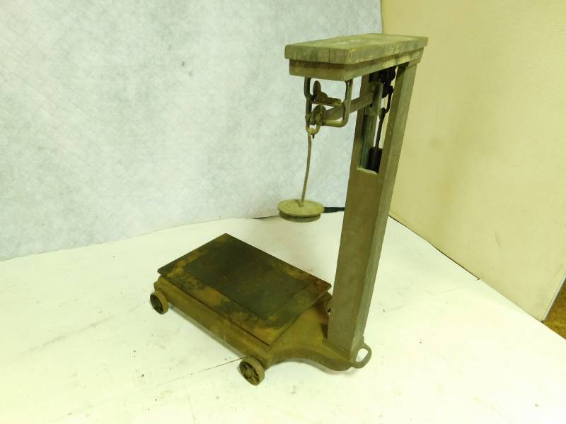 lot 30 image: Antique Scale----With Weights Of 300 lbs200 lbs  & Two 100 lb