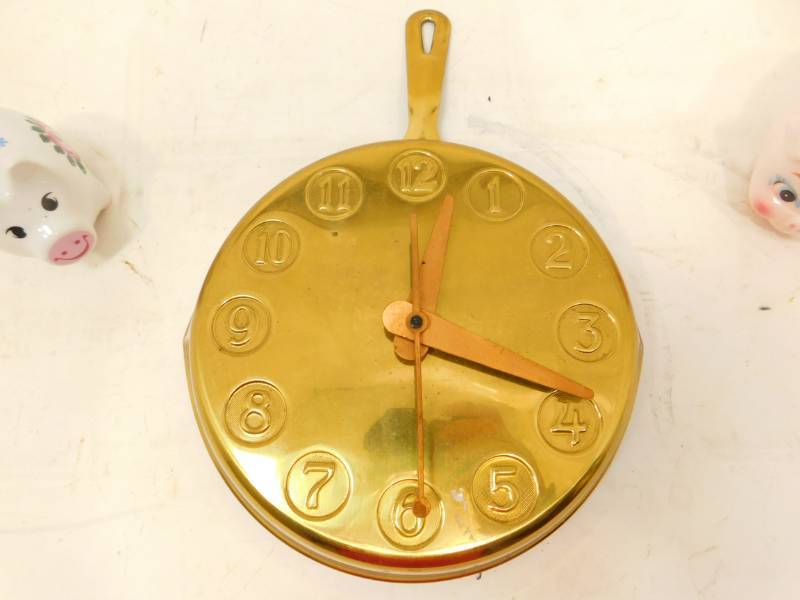 lot 68 image: Two Small China Piggy Banks And A Synchron Frying Pan Shaped Clock