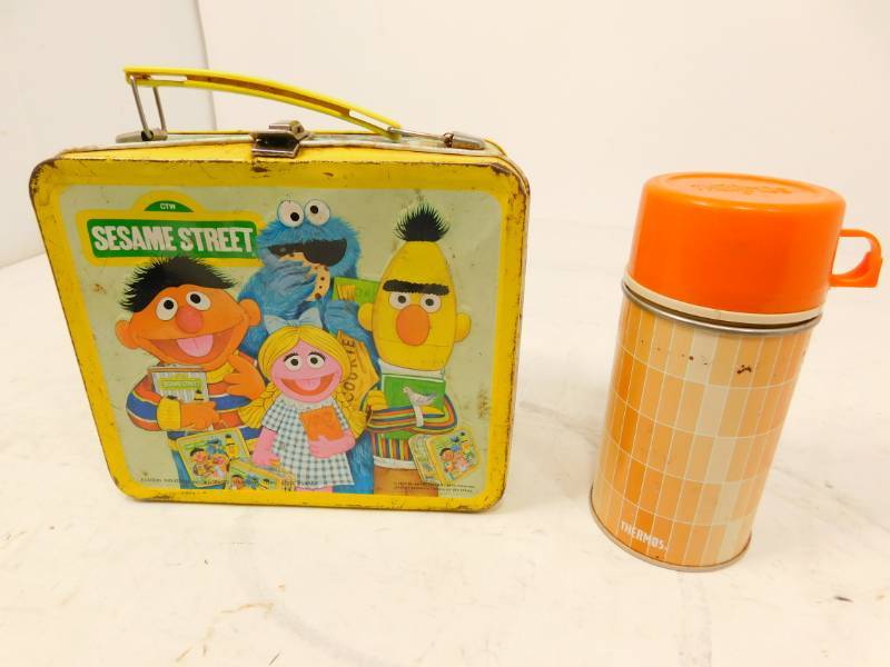 lot 48 image: Childrens Antique Sesame Street Lunch Box & Thermos