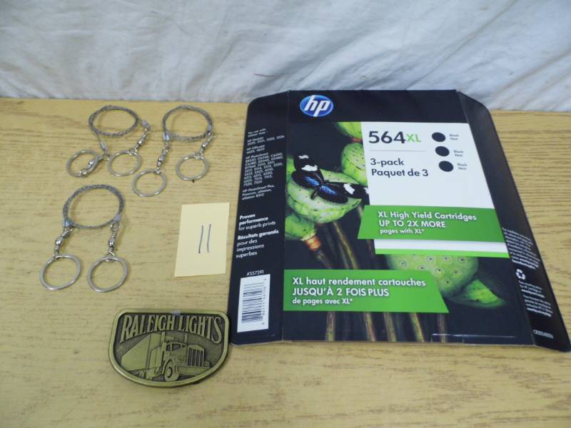 lot 11 image: HP Ink - Belt Buickle - 3 Chain Saws