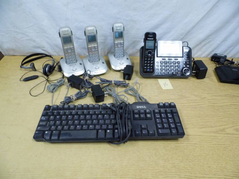 lot 15 image: Phones - Dlink Router - Keyboard