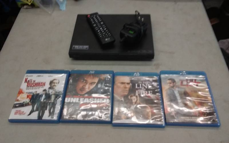 lot 34 image: LG Blu-Ray DVD Player With Remote, 4-Blu-RayDVDs