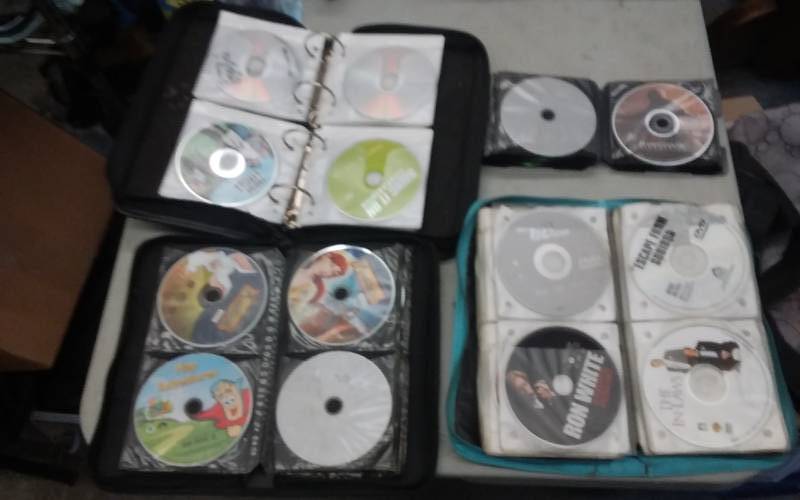 lot 35 image: Assorted Album Cases Full Of DVDs