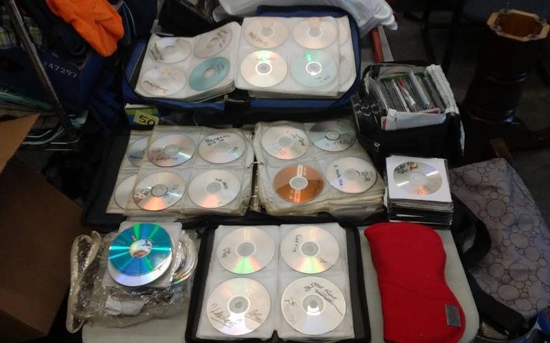 lot 36 image: Assorted Album Cases Full Of DVDs And Some CDs