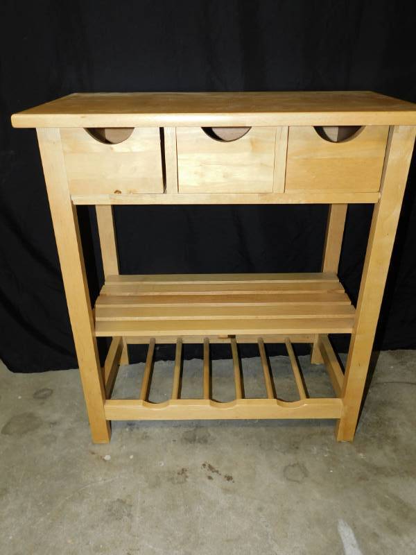 lot 8 image: Wooden Kitchen Table With Three Drawers & One Shelf & A Wine Rack On Bottom