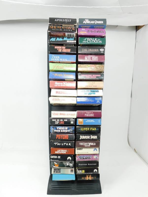 lot 22 image: Forty VCR Tapes In Display Stand
