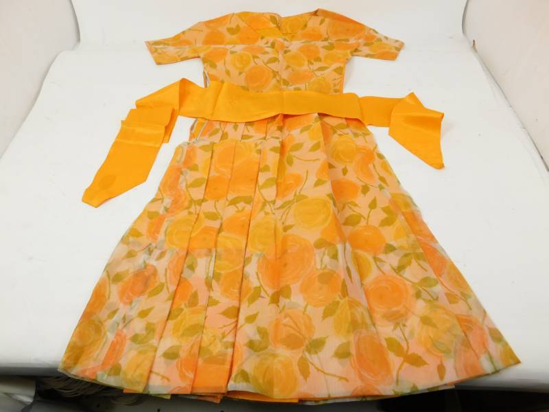 lot 77 image: Vintage Home Made Dress (Orange Floral Print)