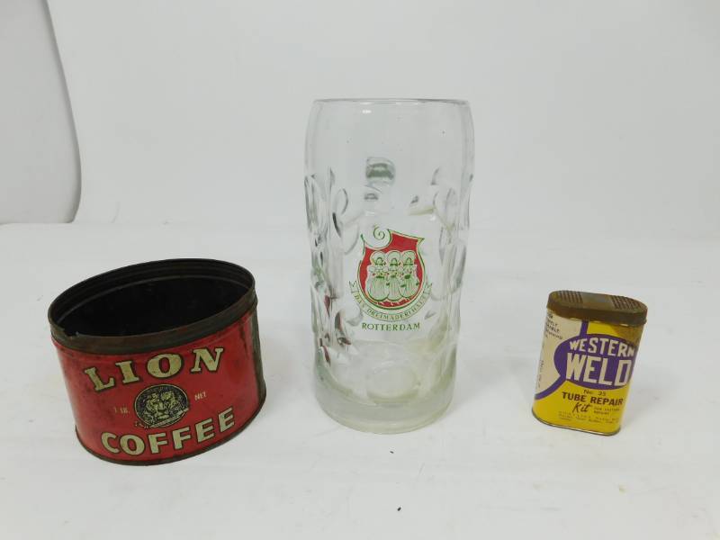 lot 82 image: Vintage Lion 1 Lb. Net Coffee Can--Glass Rotterdam Beer Mug--Western WELD  Rubber Tube Repair Kit