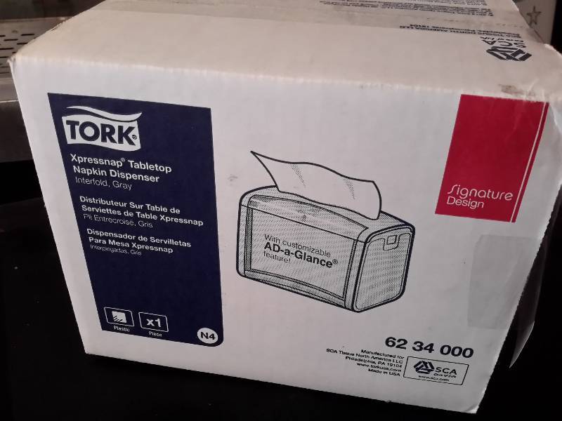 lot 48 image: Tork, Napkin holder.. NEW