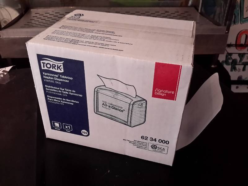 lot 49 image: Tork, Napkin holder.. NEW