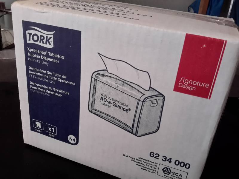 lot 52 image: Tork, Napkin holder.. NEW