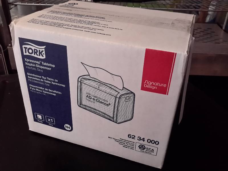 lot 53 image: Tork, Napkin holder.. NEW