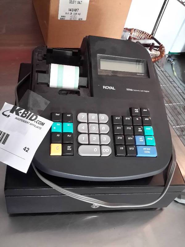 lot 42 image: Royal Cash register.. Works, but is missing the top cover as shown.