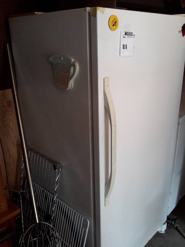lot 5 image: Kenmore, Commercial refrigerator.. Needs some cleaning, but works well.
