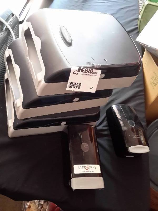 lot 58 image: 4 Marathon paper towel holders and a soap dispenser