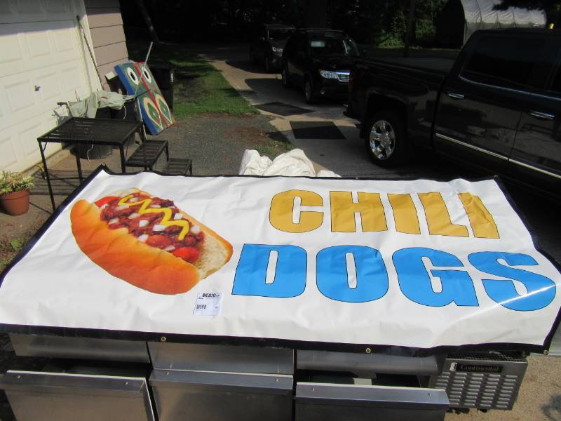 lot 24 image: Heavy Vinyl CHILI DOG sign