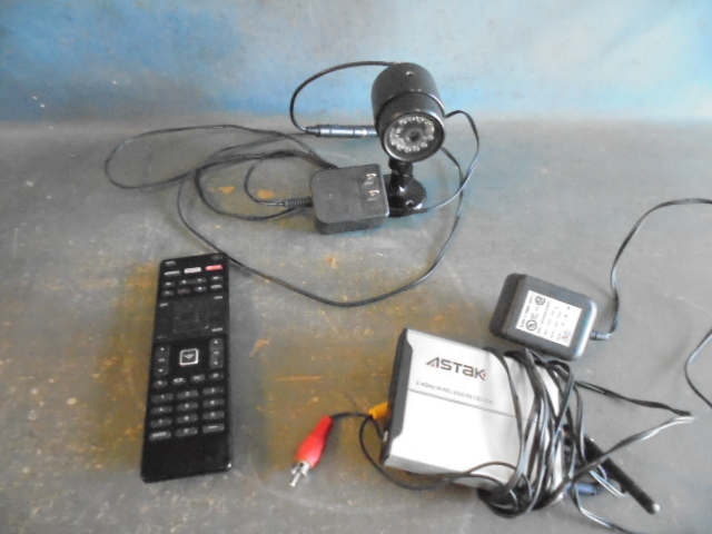 lot 16 image: Security Camera and TV Remote