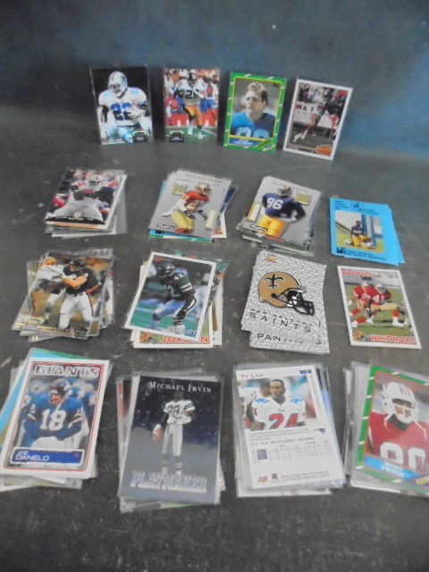 lot 23 image: Football Cards with Rice, Woodson, Largent and Rookies