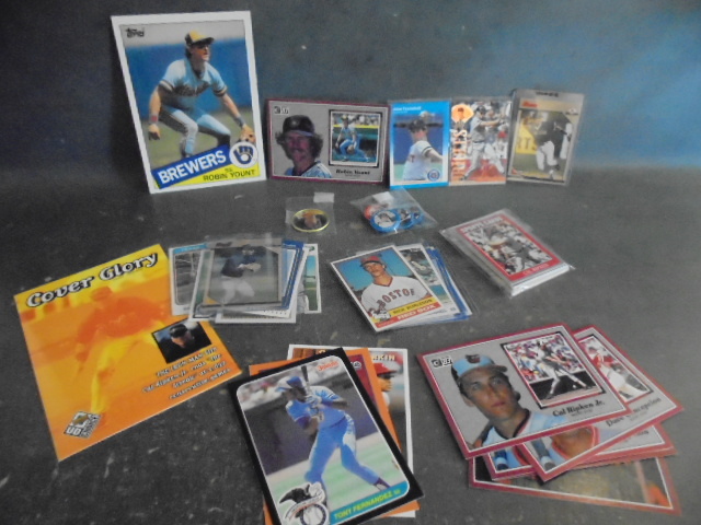 lot 46 image: MLB Star Shortstop Baseball Cards and Pins with Vintage Yount & Nomar Rookie