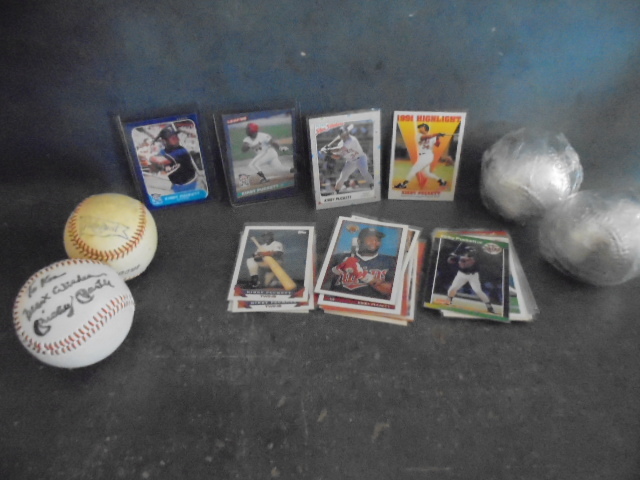 lot 60 image: Kirby Puckett Cards and New and Used Baseballs