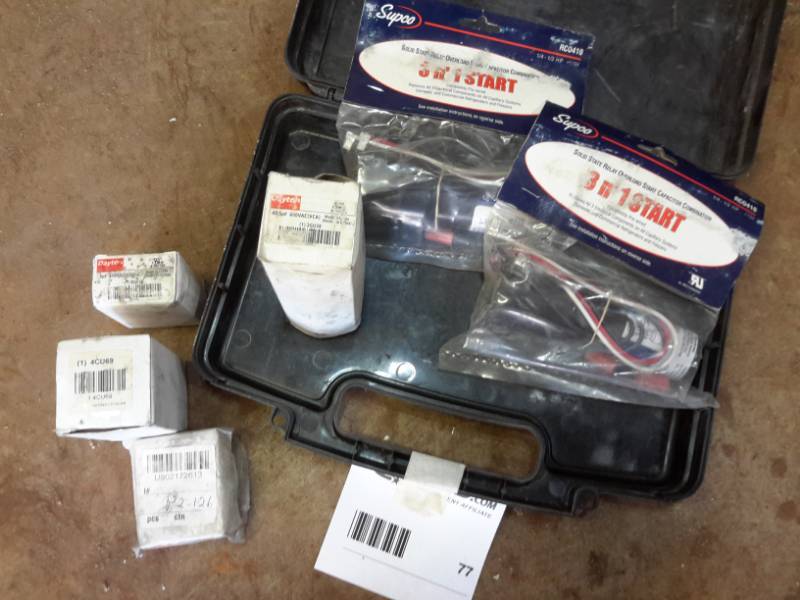 lot 77 image: Dayton Run Capacitors and 3 n 1 Start Papacitors