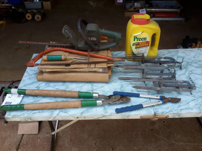 lot 99 image: Yard Tools, Gopher Spikes, Yard Waste Bags, Hedge Trimmer