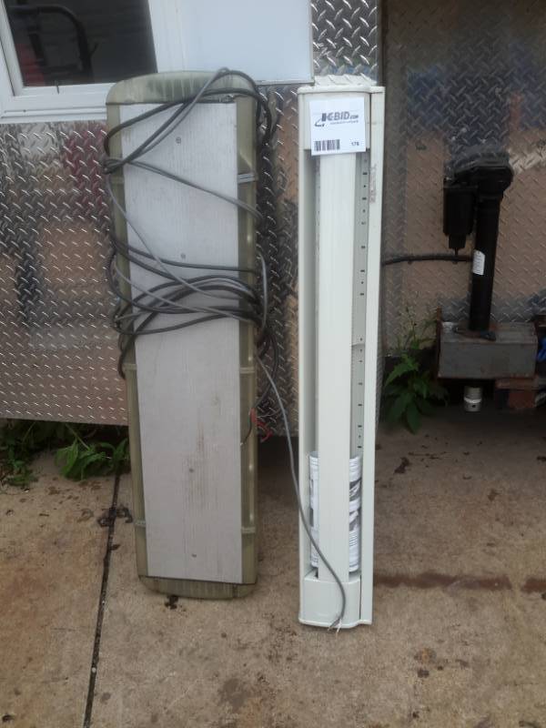 lot 176 image: 1 Never Been Used Baseboard Heater, 1 TruckShop Light