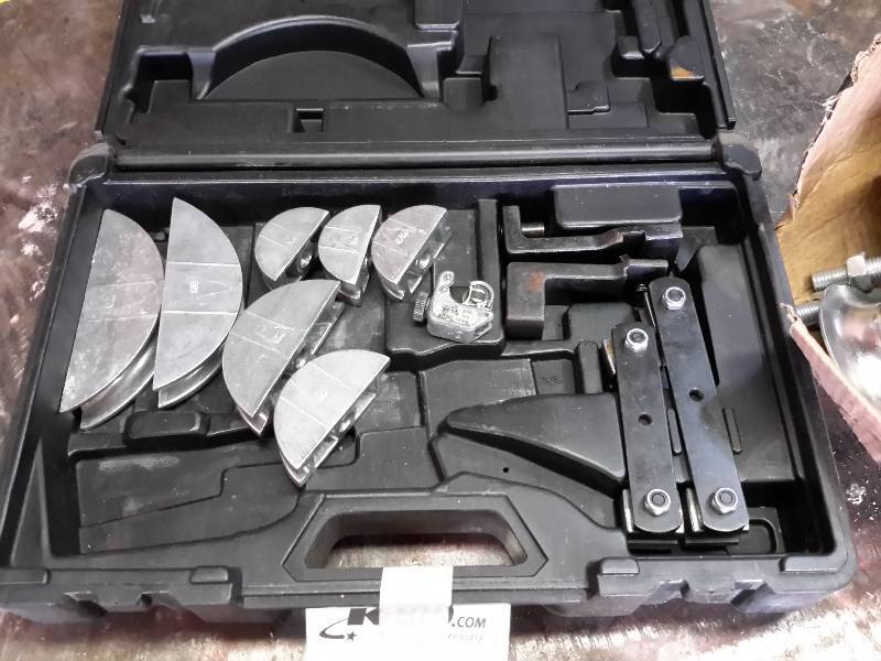 lot 28 image: Looks Like Bending Channels, 1 Box of Pulleys