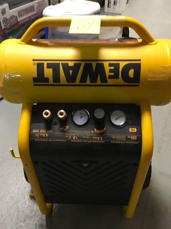 DEWALT 4.5 Gal. Portable Electric Air Compressor used in working condition