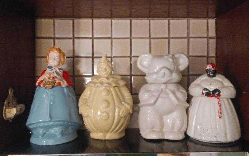 lot 5 image: 4-Collector Cookie Jars, 1-Cast Iron Match Holder