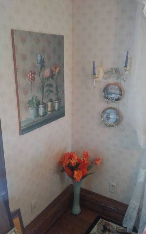 lot 30 image: Tall Glass Vase Arrangement, Picture (25x32), Plate Rack, Wall Sconces