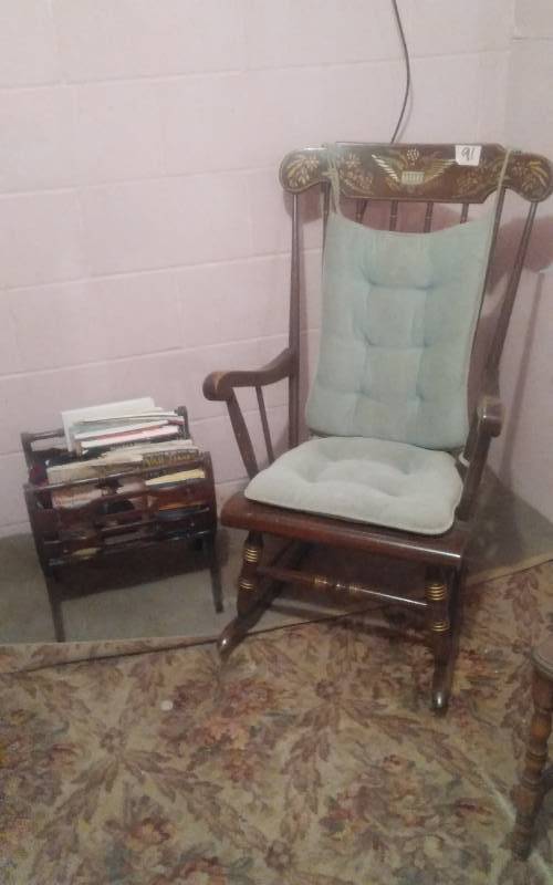 lot 91 image: Rocking Chair & Wood Magazine Rack With War Time Books & Mags