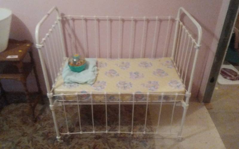 lot 96 image: Vintage Metal Crib & Roly Poly Fisher Price Ball