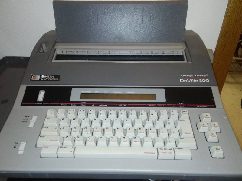 lot 35 image: Smith Corona electric word processing typewriter.  DeVille 800 model