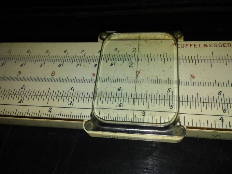 lot 56 image: K & E vintage slide rule with leather case, 20 in with slide