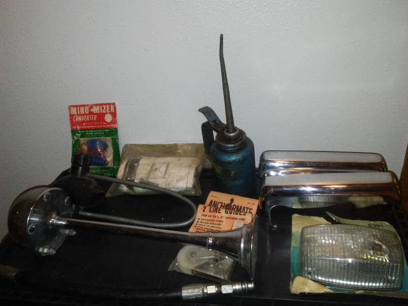 lot 83 image: MAN STUFF Chrome Horn, bumper guards, oil can, light and more.
