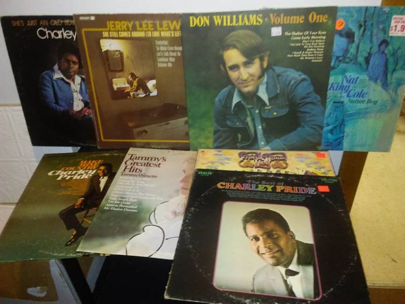 lot 91 image: Over 50 - 12 inch vinyl record albums. Includes Charlie Pride, Nat King Cole, Flatt & Scruggs, Poco Harum, Don Williams, Jerry Lee Lewis.