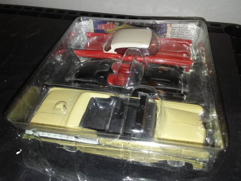 lot 94 image: 3 diecast sealed, 143 scale 1957 Chevy Corvette, 1959 Mercury and 1957 Chevy.