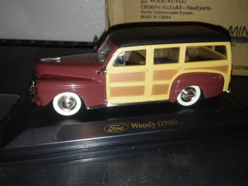 lot 102 image: Fairfield mint 1948 Ford Woody delivery truck wagon. Diecast. 143 scale.