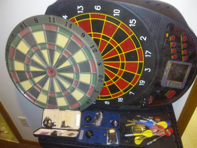 lot 124 image: 2 Dart boards, Dart tips and Feathers.