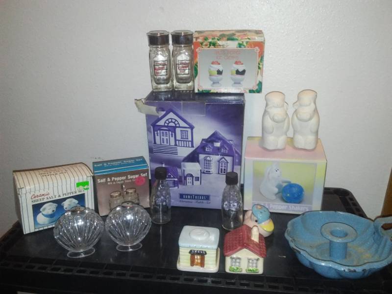 lot 125 image: Enamelware candle holders and 10 sets of unique salt and pepper shakers some new in box.