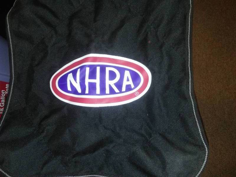 lot 128 image: NHRA collapsible stool, sleeping bag and more