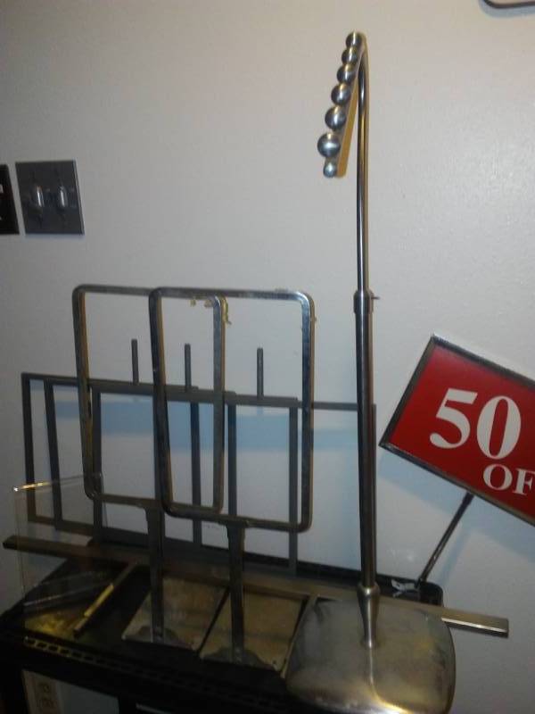 lot 132 image: Retail rack signs and clothes hangers in commercial grade tote