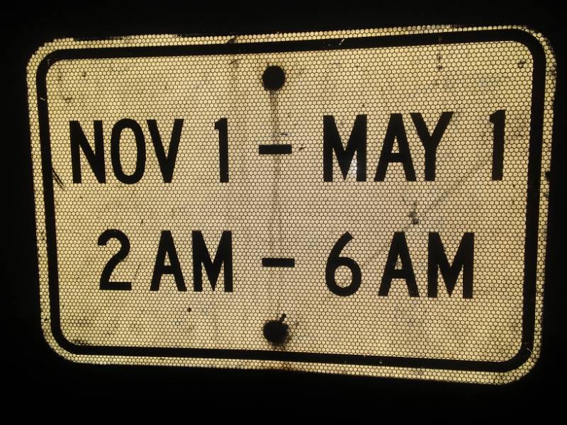 lot 144 image: Road sign. Daytime Nighttime 18 x 12. November 1st through May 1st 2 a.m. to 6 a.m.