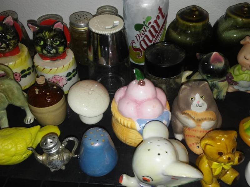 lot 150 image: Three dozen salt and pepper shakers and figurines.