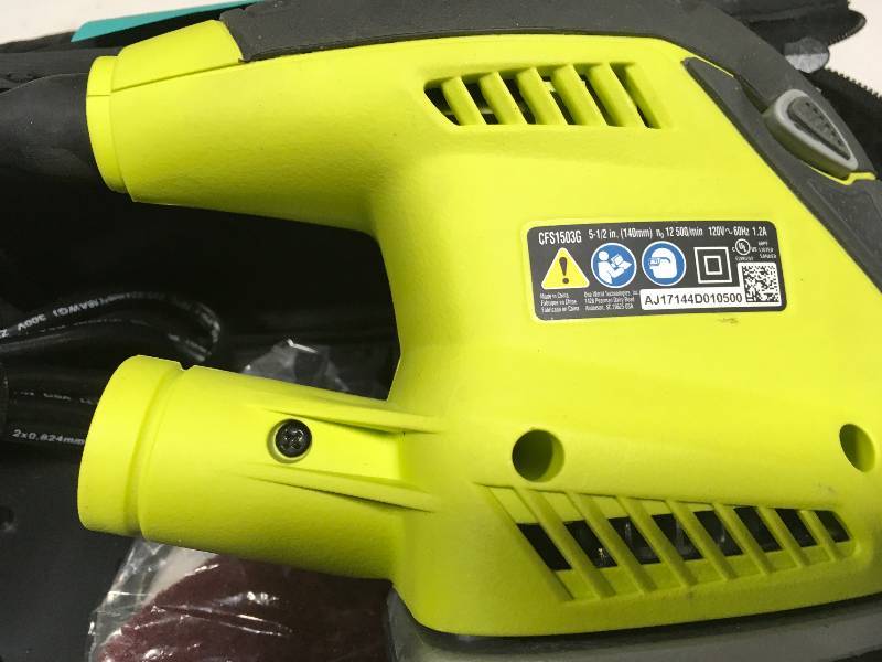 lot 8 image: Ryobi 1.2 Amp Corded 5.5 in. Corner Cat Sander used in working conditions