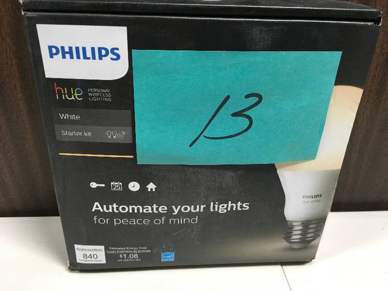lot 13 image: Philips Hue White A19 60W Equivalent Dimmable LED Smart Bulb Starter Kit 2 A19 60W White Bulbs and 1 Hub in Good condition