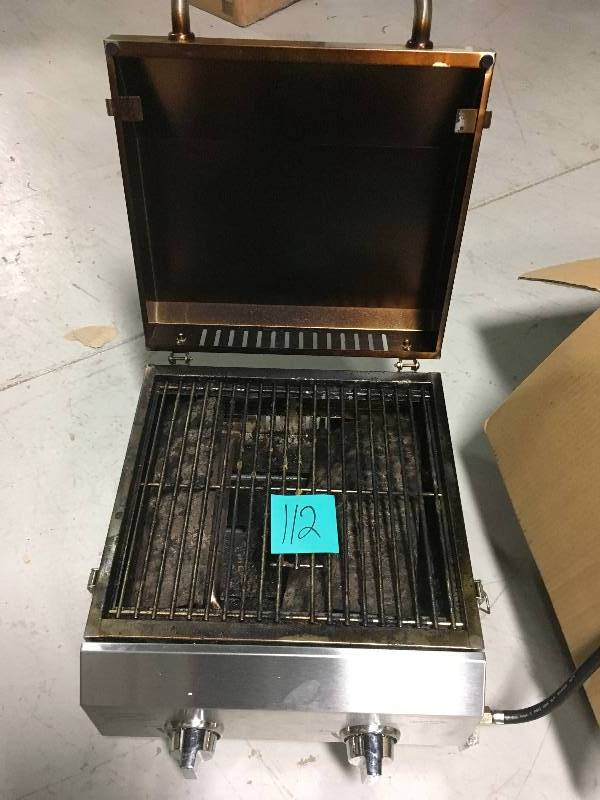 lot 112 image: Nexgrill 2-Burner Portable Propane Gas Table Top Grill in Stainless Steel used in working Condition